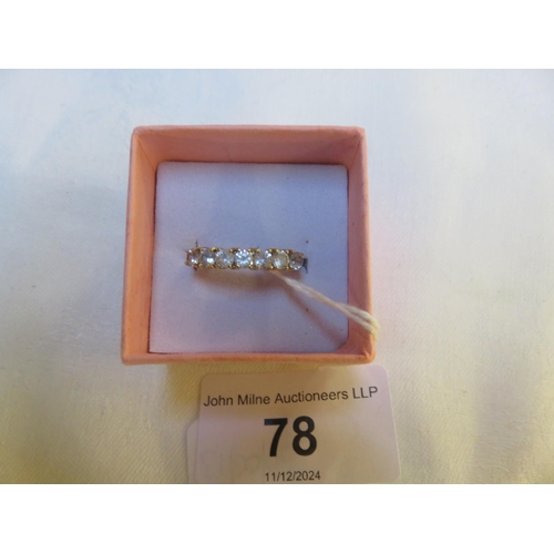 78 - 9ct Gold seven White Stone Ring.Size P/Q