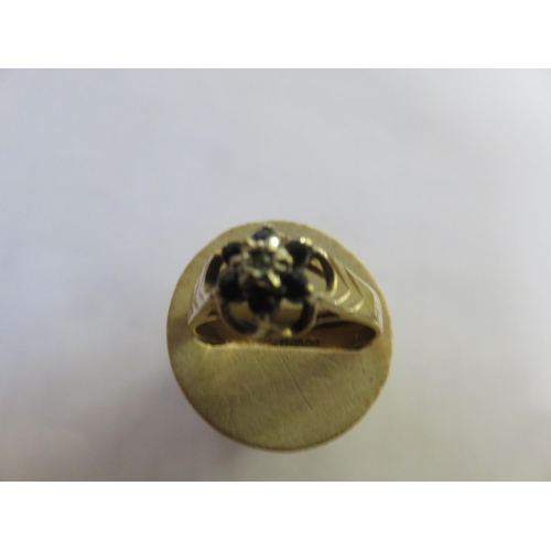 72 - 9ct. Gold Black Stone Ring