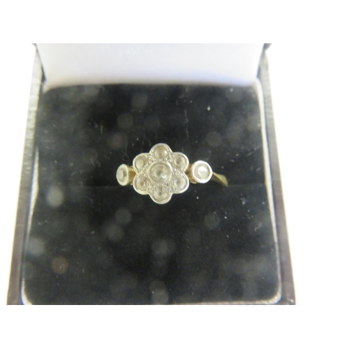 104 - 18ct. Gold and White Stone Cluster Ring, 2.06 grams