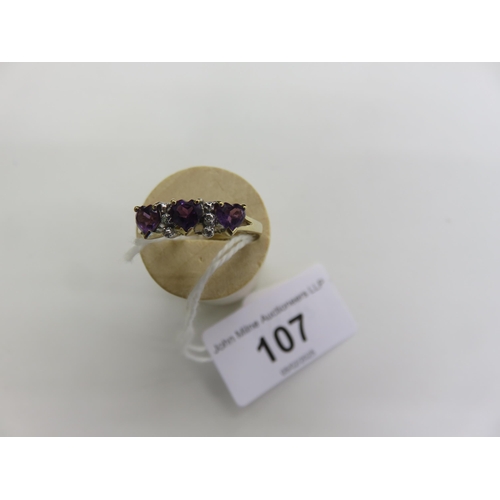 107 - 9ct. Gold Marcasite and Purple Stone Ring, 1.9 grams