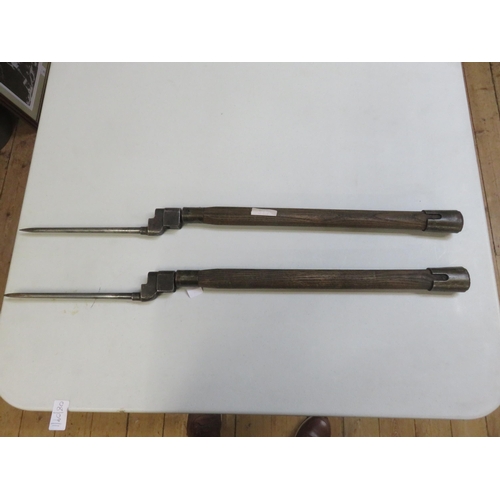 213 - Two British Entrenching Tools with attached No4 Bayonets