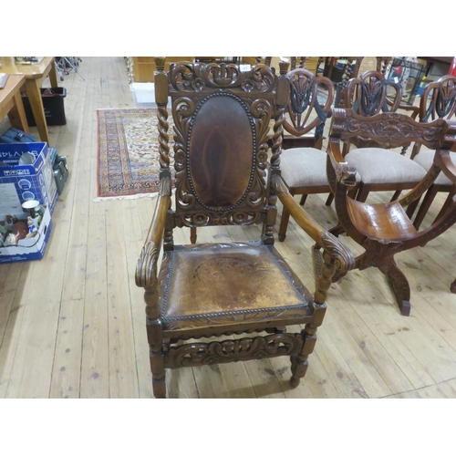 377 - Heavily Carved Oak Armchair