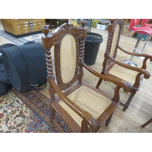 378 - Two Mahogany and Wicker Carver Chairs