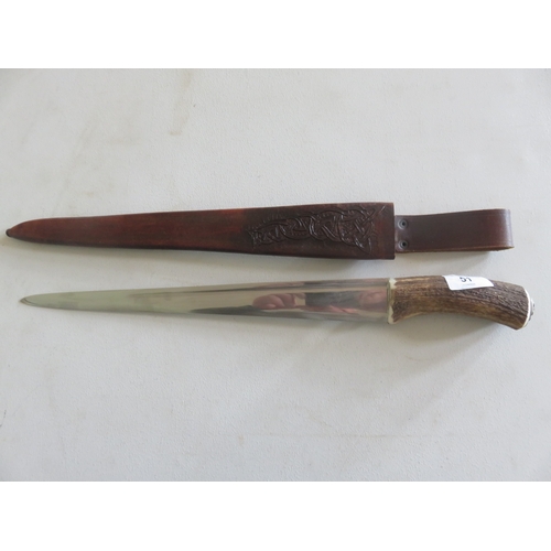 51 - Antler handled Dirk with leather Scabbard