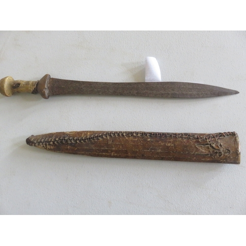 54 - Eastern Dagger with Leather Scabbard