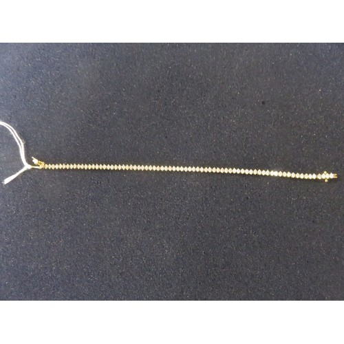 18ct Yellow Gold Tennis Bracelet Set with 75 Diamonds (2.25ct total). Length Approx. 18cm.