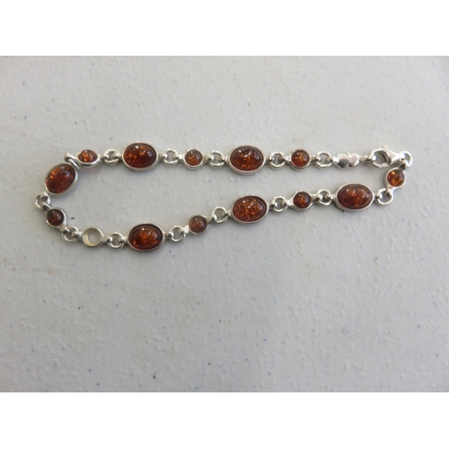 63 - Baltic Amber style Link Bracelet, Silver settings. Measures 8