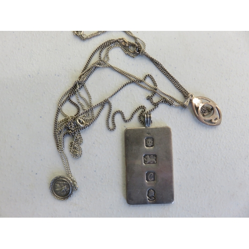 98 - Three Silver Pendants on chains