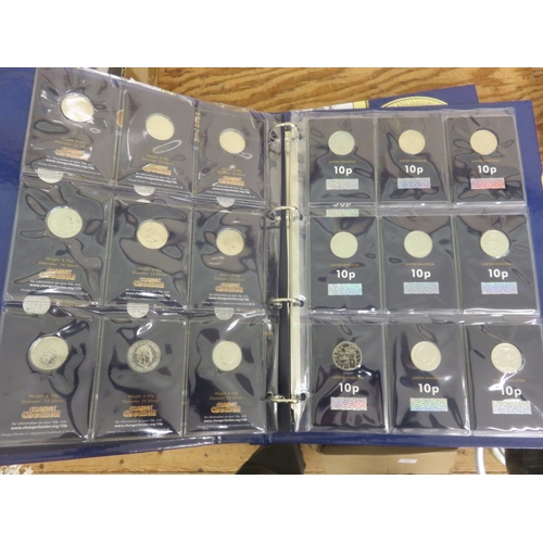 Two Change Checker Albums containing 50 pence, £1 and 10 pence coins