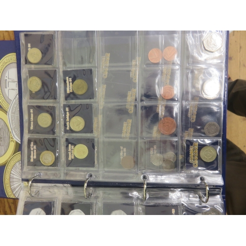 Two Change Checker Albums containing 50 pence, £1 and 10 pence coins