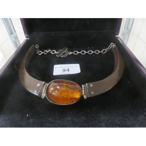 94 - Designed signed wood, silver and large gem set necklace