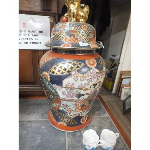 Pair of Large Japanese Imari Pattern Jars and Covers, 27 inches High
