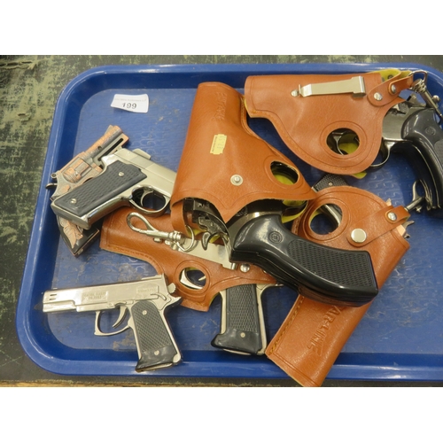 199 - Seven Novelty Lighters as Hand Guns