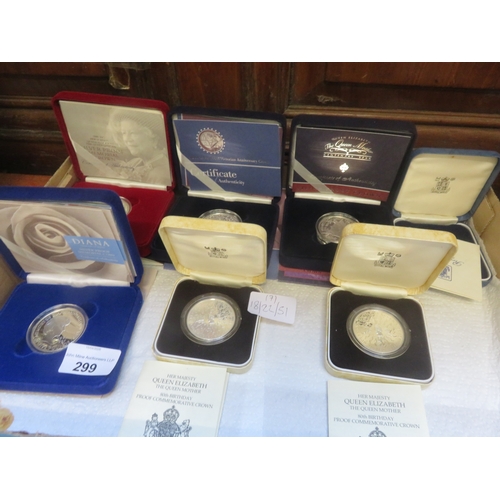 299 - Seven Silver Proof Crowns 28g. each