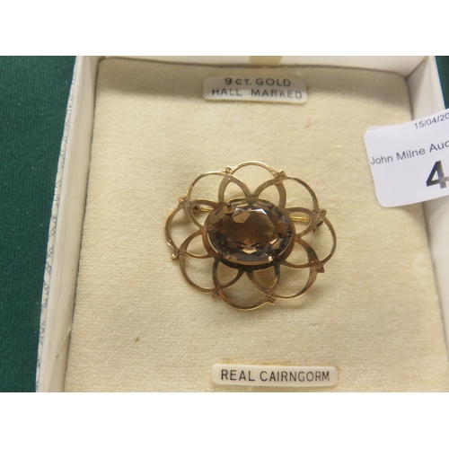 41 - 9ct Gold Openwork Brooch Set with Cairngorm Stone
