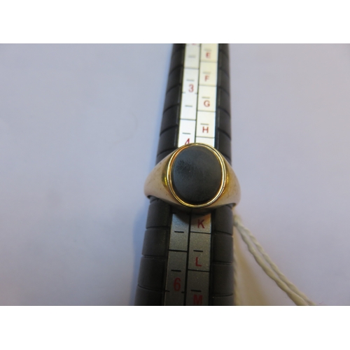 48 - 9ct Gold and Onyx Signet Ring Gross Weight 2.7g, Size J