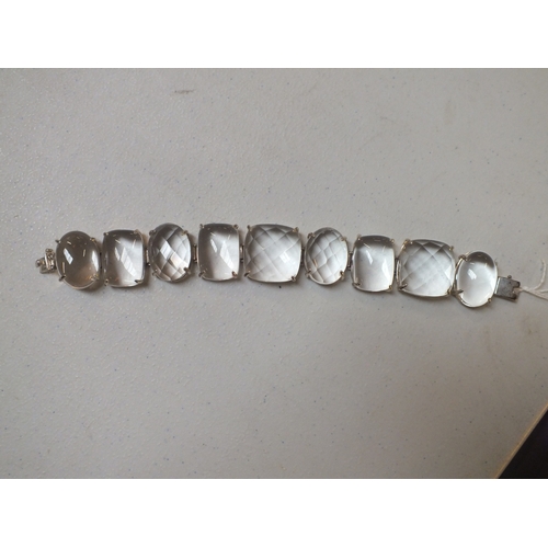 53 - Large Unmarked Silver and Polished Clear Stone Bracelet