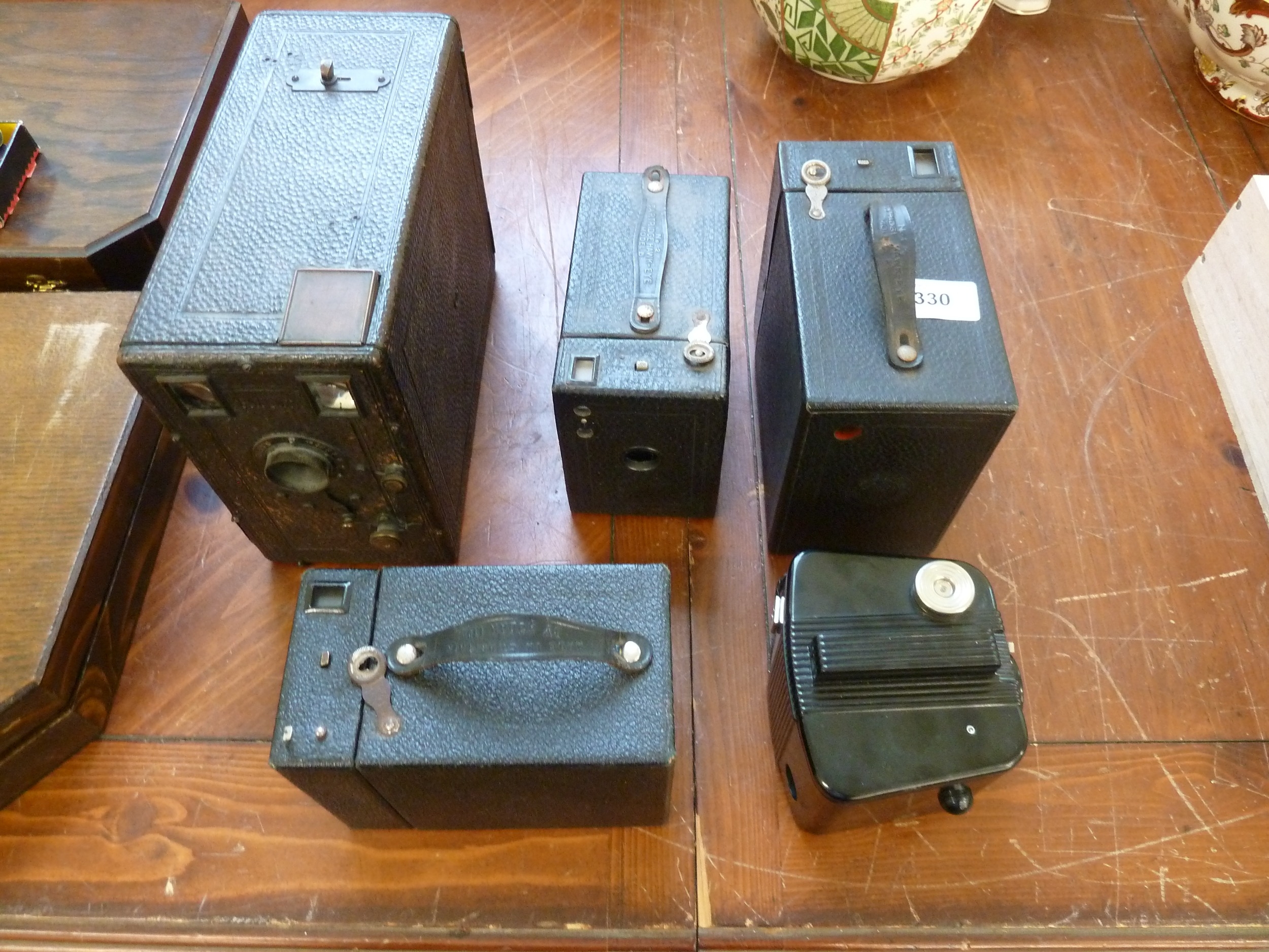 Four Box Cameras and one Bulls Eye Camera