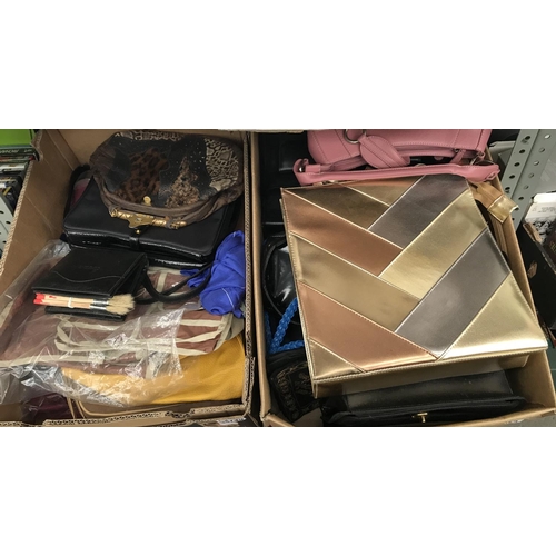 149 - 2 Boxes containing handbags