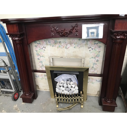 279 - Electric fire and surround