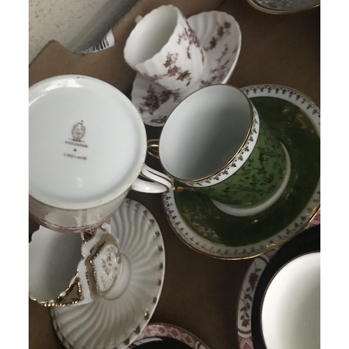 17 - Box containing ornate cups and saucers including Wedgewood etc