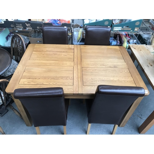 408 - Oak extending table and 4 chairs