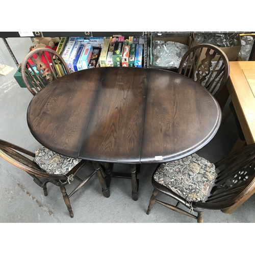 409 - Drop leaf table and 4 wheelback chairs