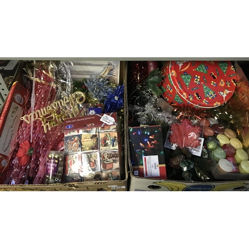 15 - 2 Boxes containing Christmas decorations including fairy lights and Yankee candles