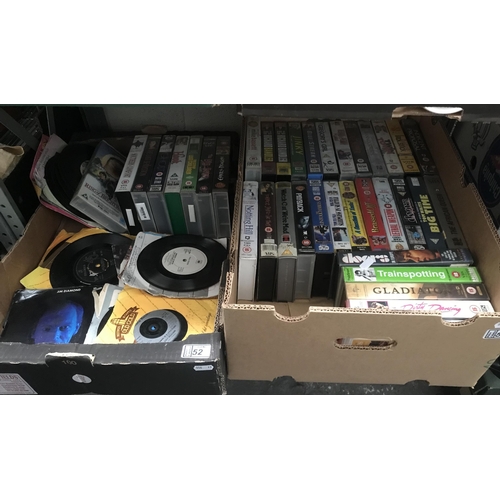52 - 2 Boxes containing 'collectable' VHS and singles