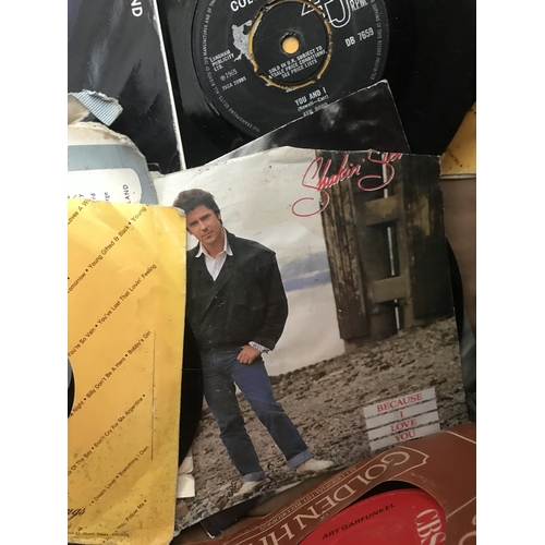 52 - 2 Boxes containing 'collectable' VHS and singles