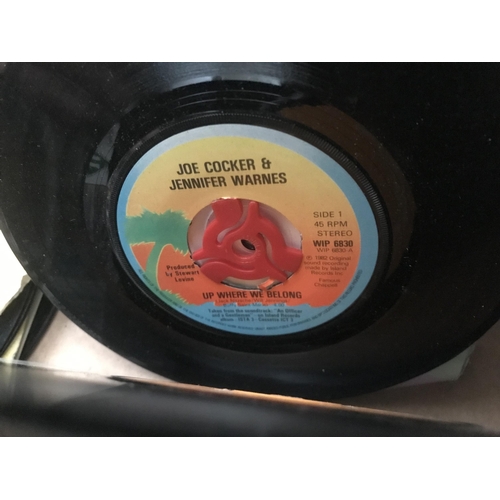 52 - 2 Boxes containing 'collectable' VHS and singles