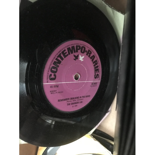 52 - 2 Boxes containing 'collectable' VHS and singles