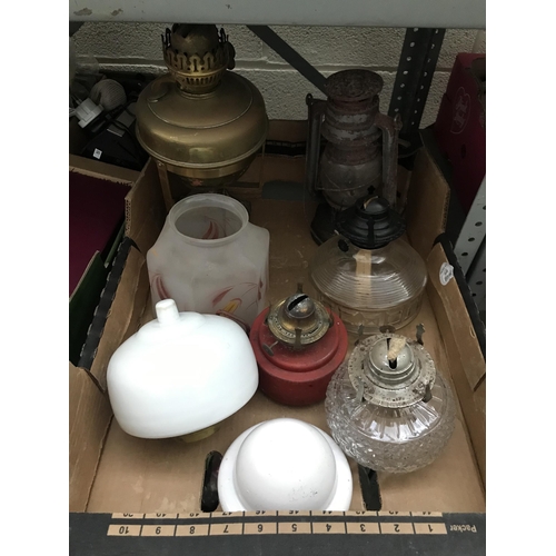 60 - Box containing vintage oil lamps and shades