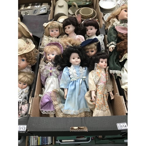 114 - Box containing collector's dolls