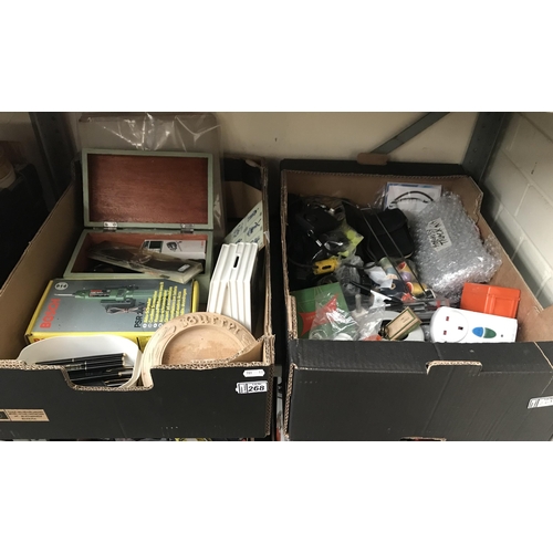 268 - 2 Boxes containing pens, watch and Rupert Bear piggy bank