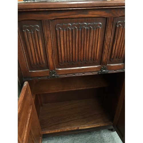 345 - Linen fold drinks cabinet