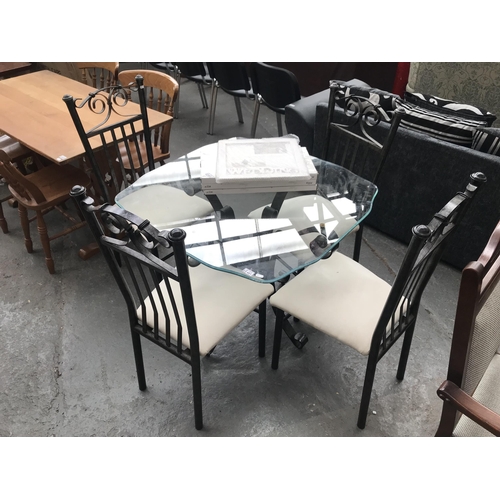 481 - Glass top dining table and 4 chairs