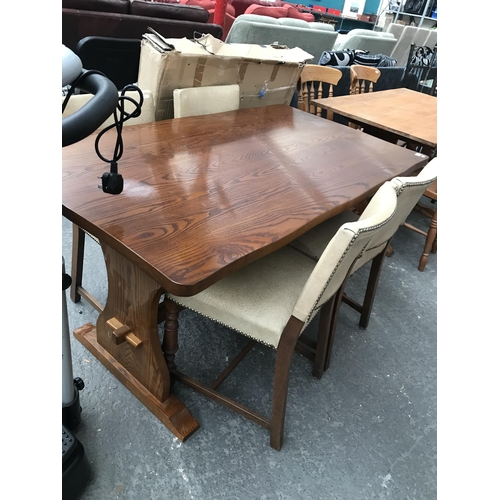 484 - Oak table and 4 chairs