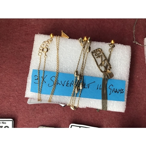 576 - Silver gilt chains (12g)