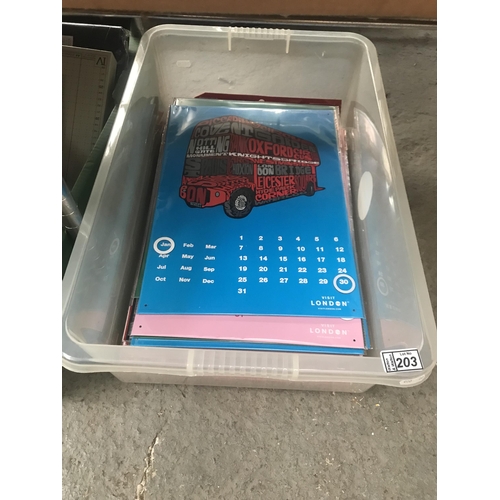 203 - Box containing metal calendars