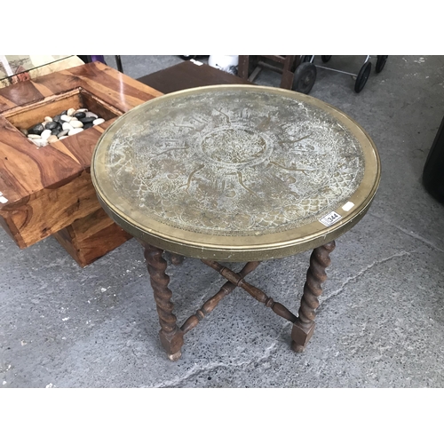 344 - Round brass top coffee table