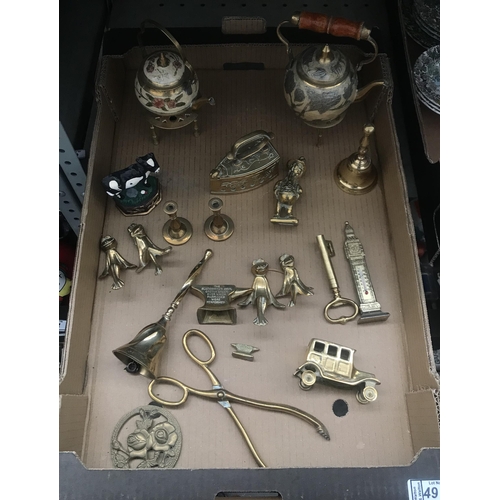 49 - Box containing brass ornaments including a flat iron and anvil