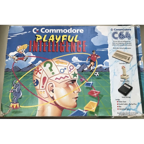 65 - Boxed 'Playful Intelligence' Commodore 64 set