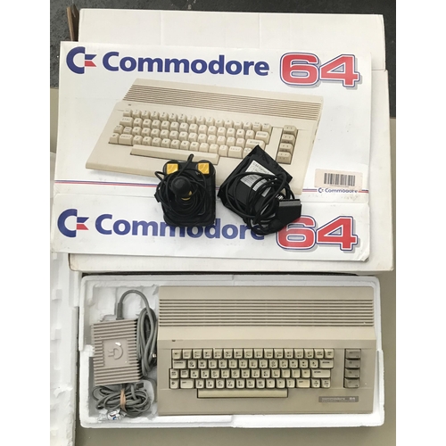 65 - Boxed 'Playful Intelligence' Commodore 64 set