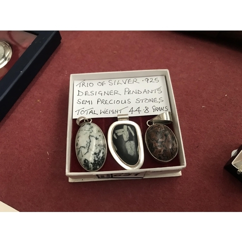 631 - Trio of silver pendants with semi-precious stones