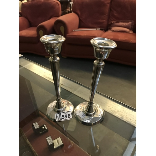 596 - Pair of silver candlesticks (total weight 234g)