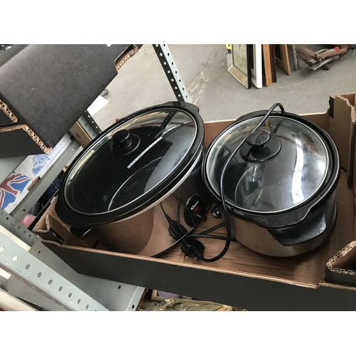 144 - Box containing 2 slow cookers