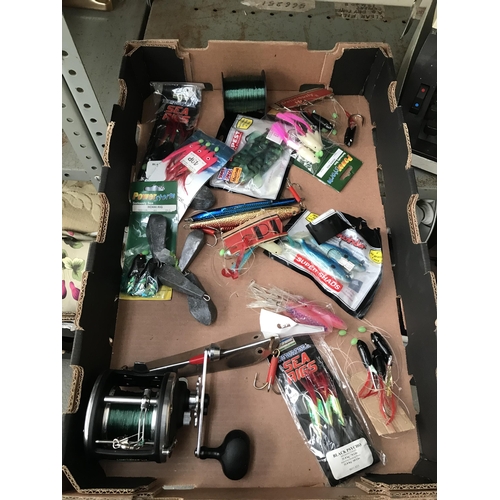 155 - Box containing fishing lures and a reel etc