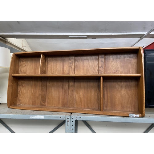 126 - Ercol shelving unit