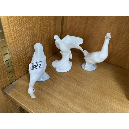 380 - A Royal Doulton bird and 2 Nao birds